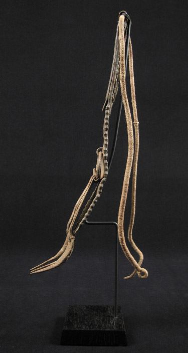African Tribal Art - Forked iron and leather cache-sex, Kirdi, Cameroon, side view