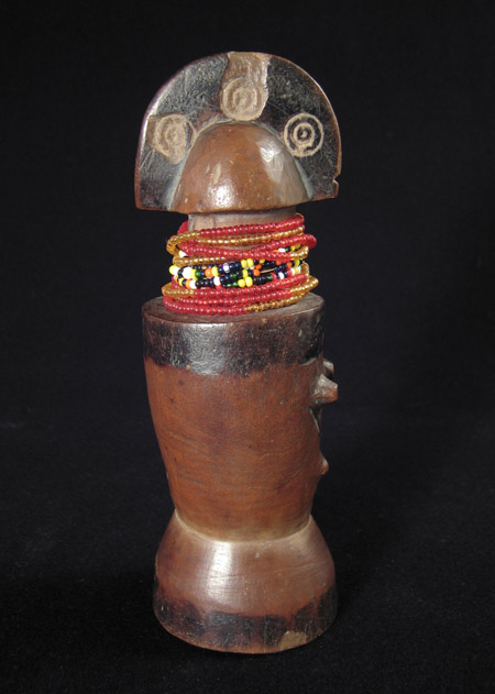 African Tribal Art - Wood doll, Zaramo, Tanzania, left