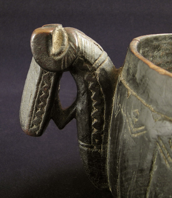 Asian Tribal Art - Wood milk jug, Afghanistan, head