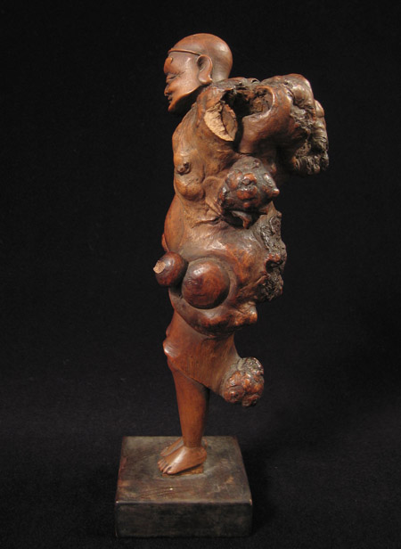Asian Tribal Art - Male figure, China, right