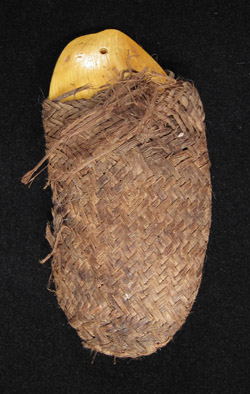 Oceanic Art -  Shell currency with pouch, Massim, Papua New Guinea, in pouch