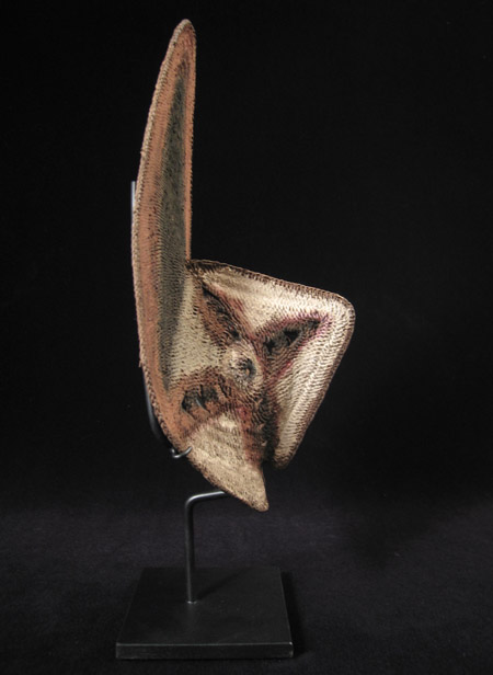 Oceanic Art - Woven yam mask, Abelam, Papua New Guinea, left