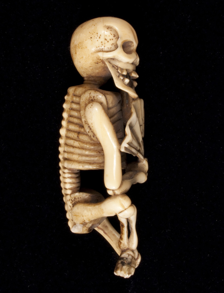 Skeleton okimono, left side