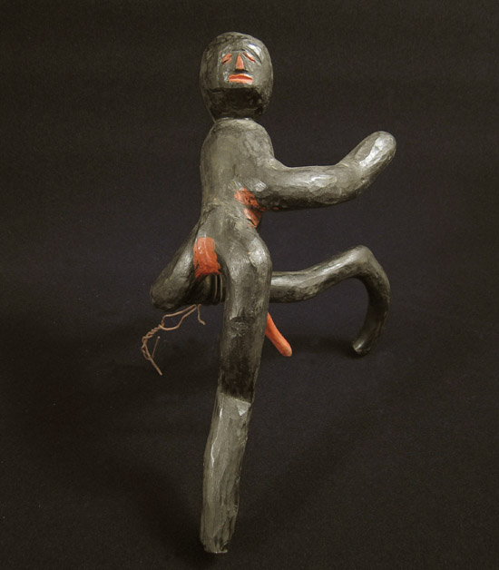 Curiosities - Wood running man, back