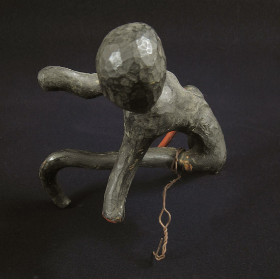 Curiosities - Wood running man, top