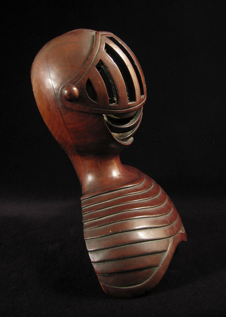 Curiosities - Wood knight finial, left