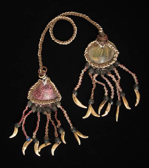 Oceanic Art - Shell ear ornaments, Collingwood Bay, Papua New Guinea